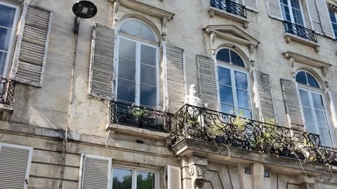 Classic Haussmann Architecture Facade with Wrought Iron Balconies in Paris Stock Footage 335855046