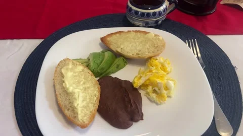 Classic Honduran Breakfast with Beans, Eggs and Avocado Stock Footage 328069422