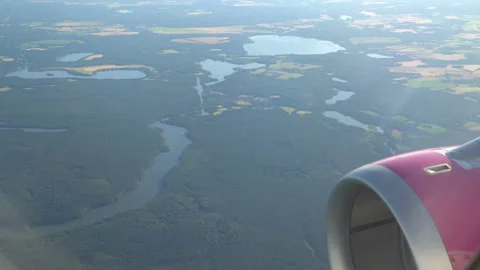 Classic image through aircraft window onto jet engine Видео 92995798