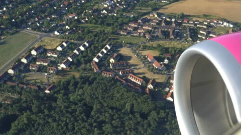 Classic image through aircraft window onto jet engine Stock Footage 92996659