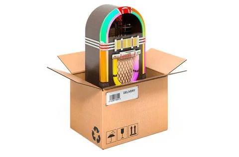 Classic jukebox inside cardboard box, delivery concept. 3D rendering Illustrazione stock