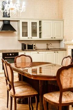 Classic Kitchen and Dining Area with Elegant Design Elements Stock Photos
