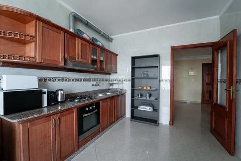 Classic kitchen fully equipped with the necessary appliances Stock Photos