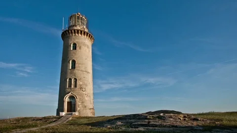 Classic Lighthouse on the blue sky time lapse. Slowmo clouds 스톡 동영상 84809441