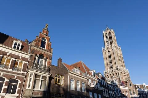 A classic low-angle view showcasing the varied gabled rooftops of historic Du Stock Photos