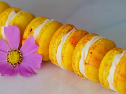 Classic mini macaroons on white background close up Foto stock