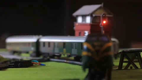 Classic Model Train Moving Through Railway Station Video stock 342618688