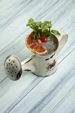Classic Mojito. white rum, mint leaves, lime and lime wedges topped with soda Stock Photos