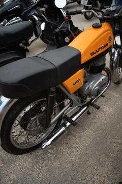 Classic motorcycle on display at a small classic car show. Stock Photos