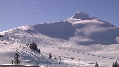 CLASSIC MOUNTAIN WITH SKIERS Stock Footage 121444542