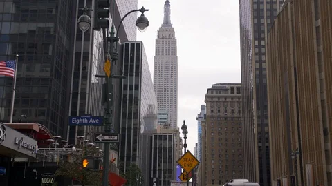 Classic New York Traffic On Eighth Avenue With Impressive Iconic New York Sky Stock Footage 114019563