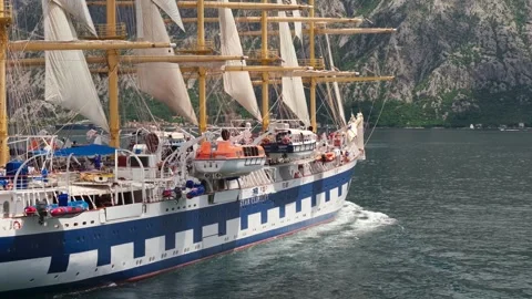 Classic old  sail ship with a white sails goes in the Bay of Kotor. Royal Video stock 277915031