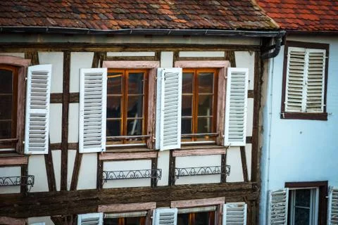 Classic old windows in timber-framing building, Alsace Stock Photos