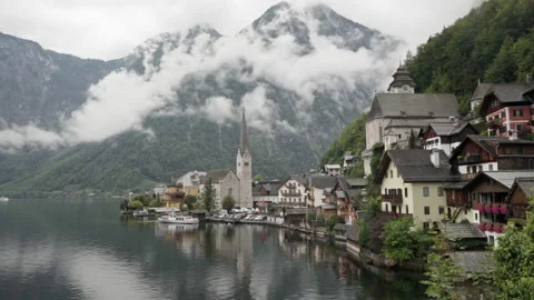 Classic panoramic view of alpine mountain lake village Hallstatt in Austria Stock Footage 150416000