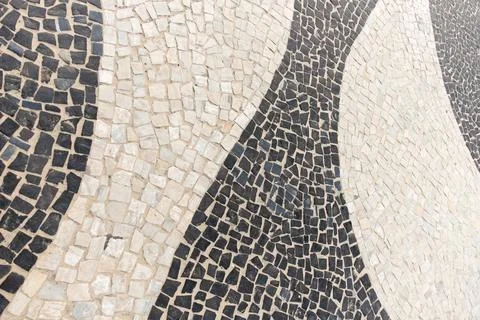 Classic pattern of Copacabana sidewalk. Rio de Janeiro, Brazil. Stock Photos