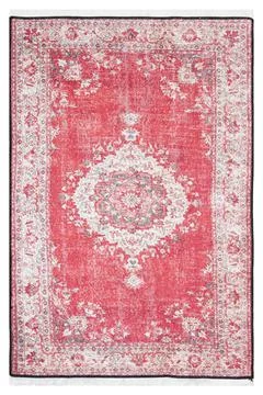 Classic patterned machine rug on a white background Foto stock