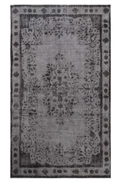 Classic patterned machine rug on a white background Foto stock