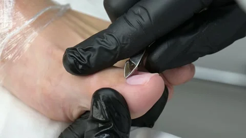 Classic pedicure using professional tools and tweezers. Pedicure lesson Stock Footage 208064352