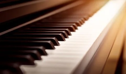Classic piano keyboard background with selective focus Фото