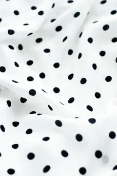 Classic polka dot textile background texture, black dots on white luxury fabr Stock Photos