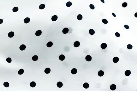 Classic polka dot textile background texture, black dots on white luxury fabr Stock Photos