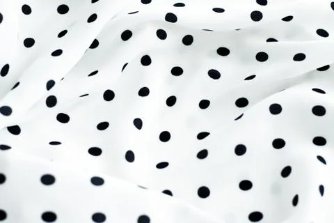 Classic polka dot textile background texture, black dots on white luxury fabr Stock Photos