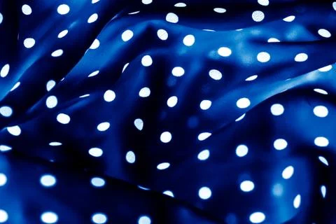 Classic polka dot textile background texture, white dots on blue luxury fabri Stock Photos