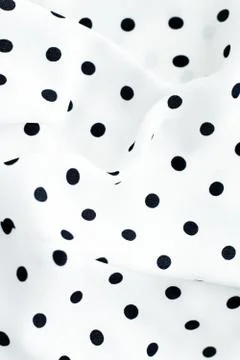 Classic polka dot textile background texture, black dots on white luxury fabr Stock Photos