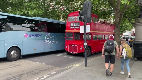Classic red double decker bus near London Eye in London England Vidéo 334718111