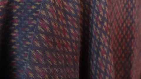 Classic red Thai fabric pattern in natural light, texture background Stock Footage 296731687