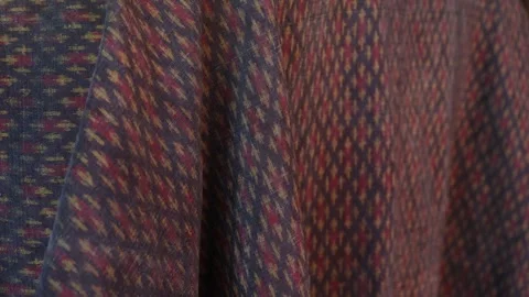 Classic red Thai fabric pattern in natural light, texture background Stock Footage 296731834