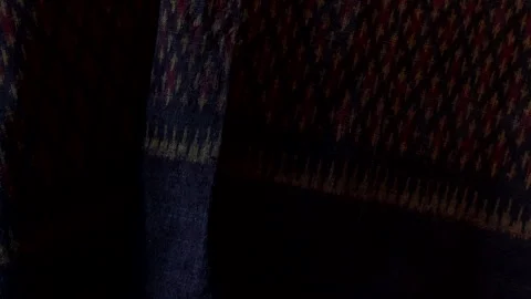 Classic red Thai fabric pattern in natural light, texture background Stock Footage 296732430