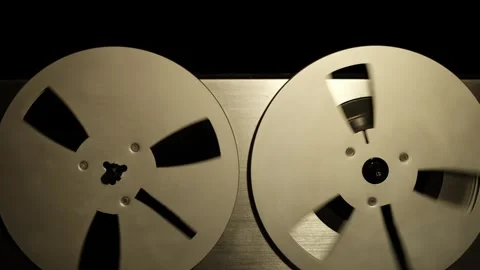 Classic Reel to Reel Spools Playing Vintage Tape Stock Footage 304064148