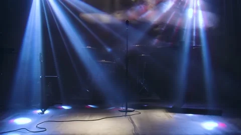 Classic retro chrome microphone and electric guitar together with drums and Stock Footage 136318899