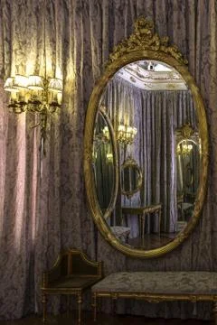 Classic room reflected in a mirror Stock Photos