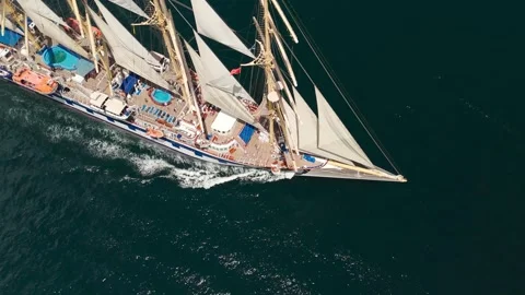 Classic sail ship with a white sails goes in the sea. Royal clipper ship in the Stock Footage 277931516