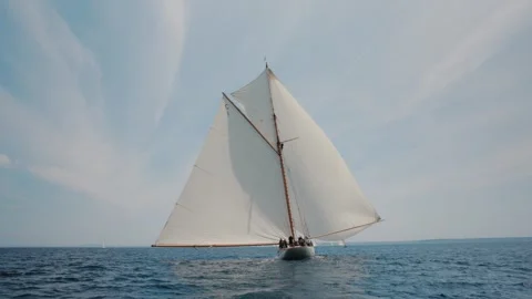 Classic sailing yacht approaching under full sail during a traditional regatta Stock-Footage 345287558