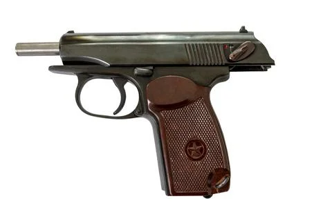 Classic semi automatic pistol with slide locked open isolated on white Fotos Stock