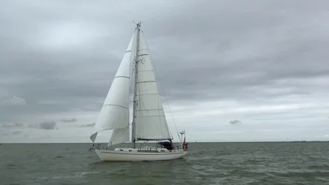 Classic sharp yacht under sail Stock Footage 80056650