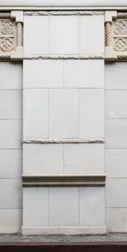 Classic stone column base detail. Stock Photos