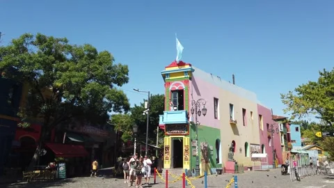A classic street view of famous triangular building in Caminito, decorated with Stock Footage 327785178