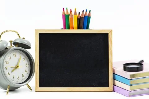 A Classic Study Station featuring a Chalkboard alongside a set of Colorful .. Stock Photos