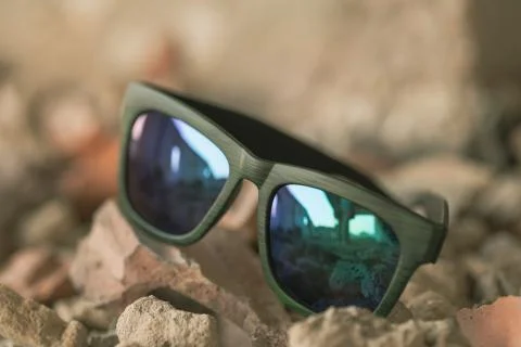 Classic sunglasses model shoot in creative indoor place closeup. Selective focus Stock Photos