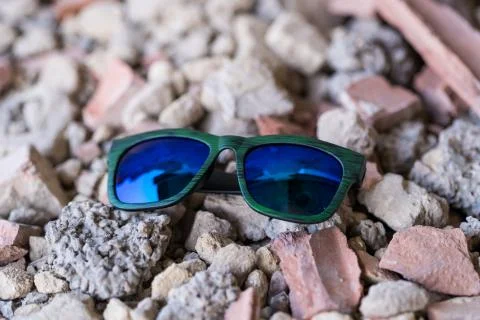 Classic sunglasses model shoot in creative indoor place closeup. Selective focus Stock Photos
