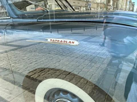 Classic Tatra Plan on display in a vibrant city street during sunny weather Stock Photos