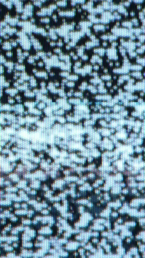 Classic television, snowy reception image. Vertical video. Stock Footage 334850110