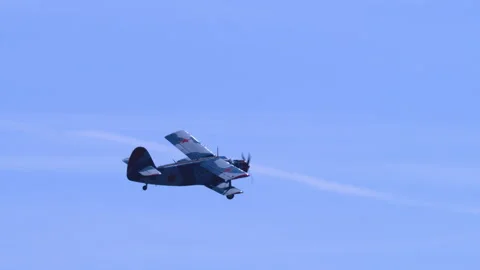 Classic Utility Aeroplane Antonov AN-2 Steady Level Flight Alpine Sky Tracking Stock Footage 332325247