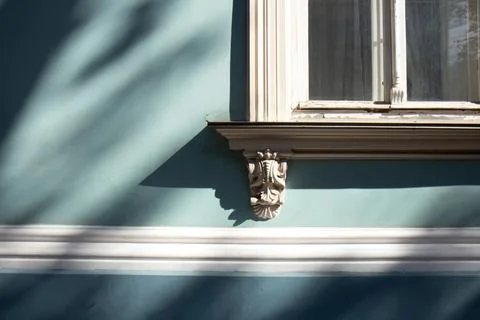 Classic vintage building facade. Elements of the architecture decorations of  Stock Photos