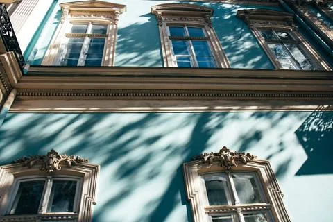 Classic vintage building facade. Elements of the architecture decorations of  Stock Photos