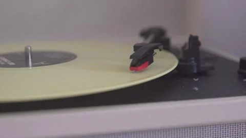 Classic vinyl record player. Shooting using a retro Stock Footage 303777330